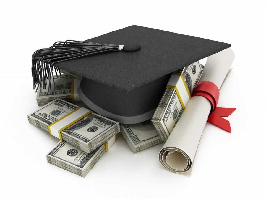 Mortarboard and diploma standing on 100 dollar bills.