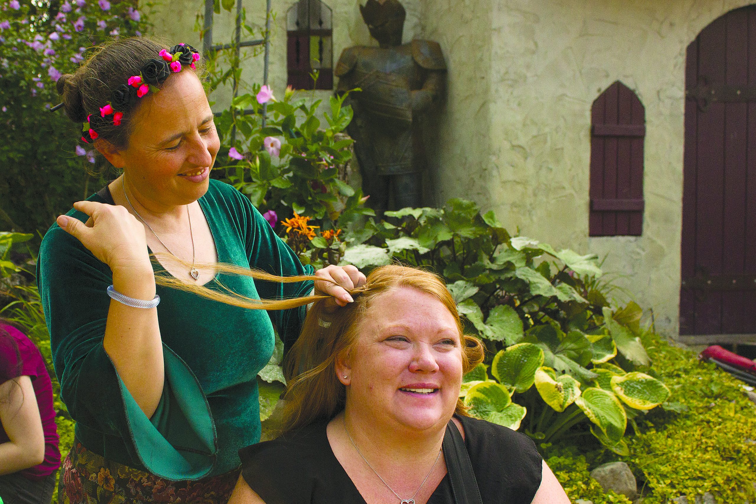 long hair braiding by man