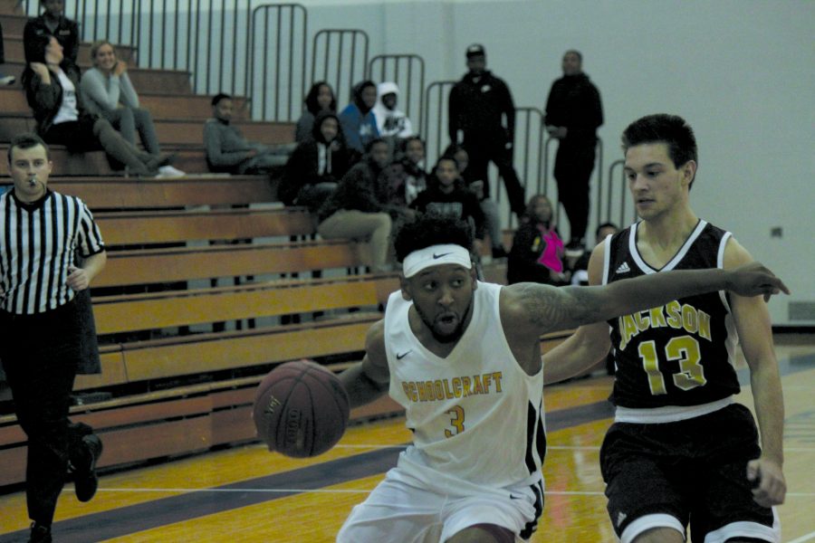 Guard Phillip Nelson (#3) blocks Jackson guard Chase Pierce to secure a 106-85 win on Nov. 8 and the Ocelots’ standing as 5th in the nation.
(Photo by David Vega, Staff Photographer)