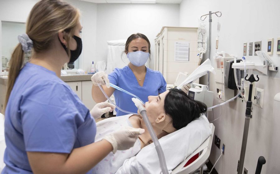 Spring Nursing 205 students attend to a patient during an ICU scenario inside the Nursing SIM Lab on June 16, 2020.