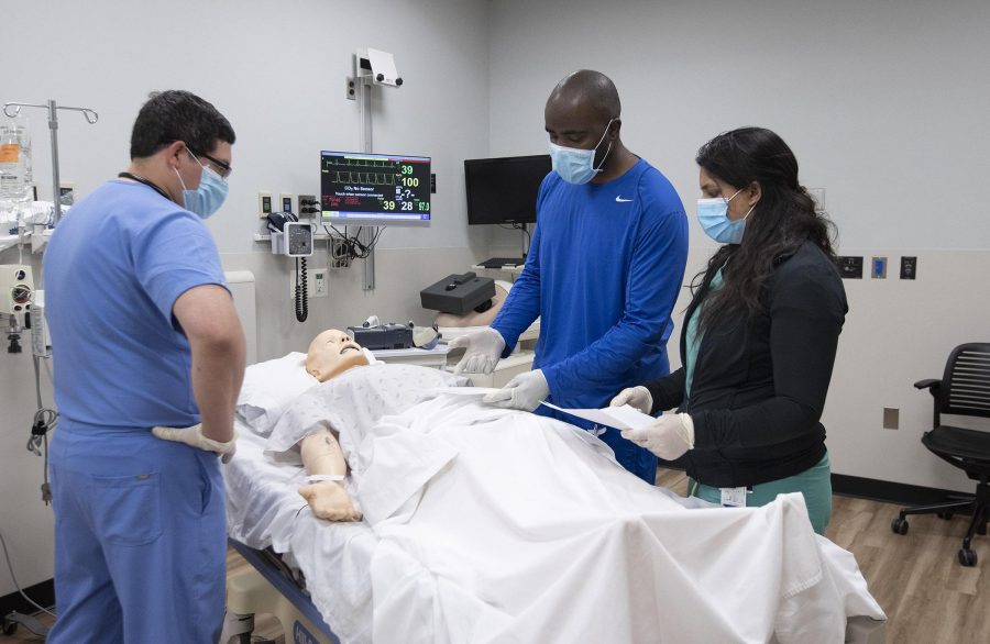 First year Emergency Medicine Residents at Livonias St. Mary Mercy Hospital practice a medical scenario on a SIM lab patient on Wednesday, June 24, 2020.