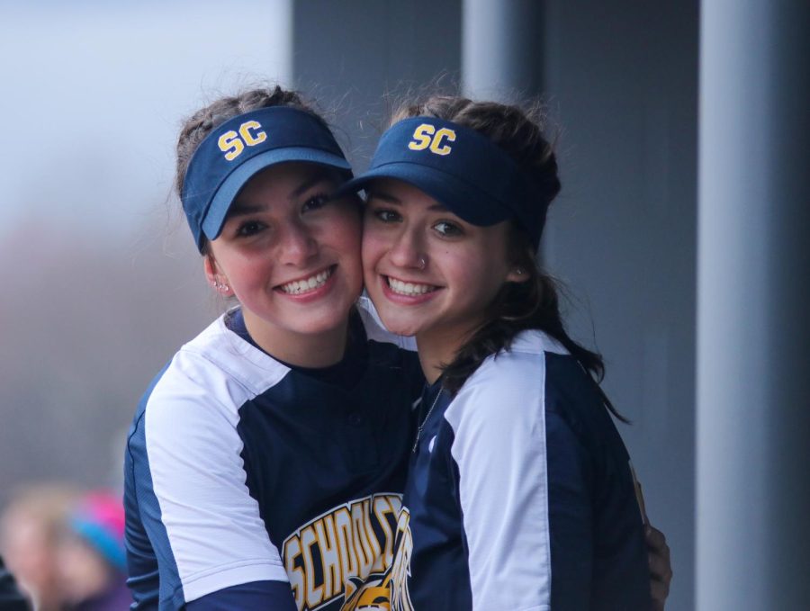 Alina Uicker and Madie Latham smiling after a split doubleheader vs Macomb Community College on April 8, 2022.