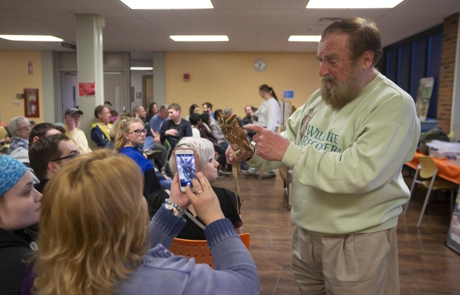 Joe Rogers of the Wildlife Recovery Association holds up a Short Eared Owl to audience members at the Birds of Prey show in 2019. The Birds of Prey Show returns to SC on September 28 for two shows.