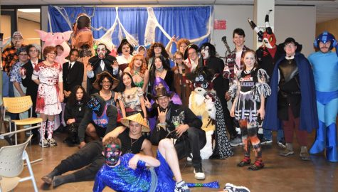 Students gather for a group photo at the Halloween Party sponsored by the Student Activities Board on October 26, 2022 in the Lower Level of the VisTaTech Center.