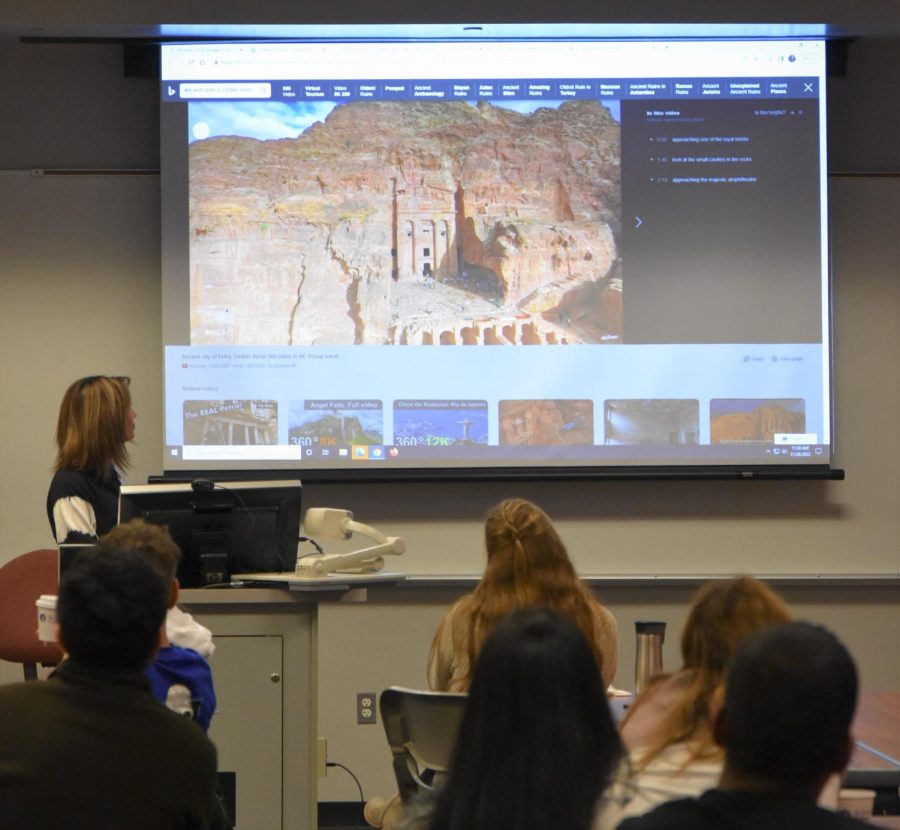 Student teaching room about the ruins in their home country of Jordan, at the Cultural Coffee Connection on Nov 28, 2022 , at schoolcraft college.