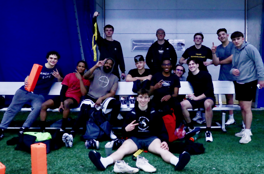 The flag football club poses for a photo in the Trinity Health Sports Dome on Sunday, March 26, 2023.