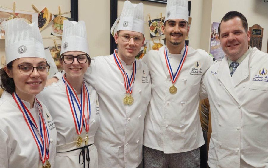 The Salon team consists of (left to right) Maddie Grupa, Bella Breazeale, Mason Cochran, Cameron Aramia, and Master Chef Drew Sayes as head coach. 