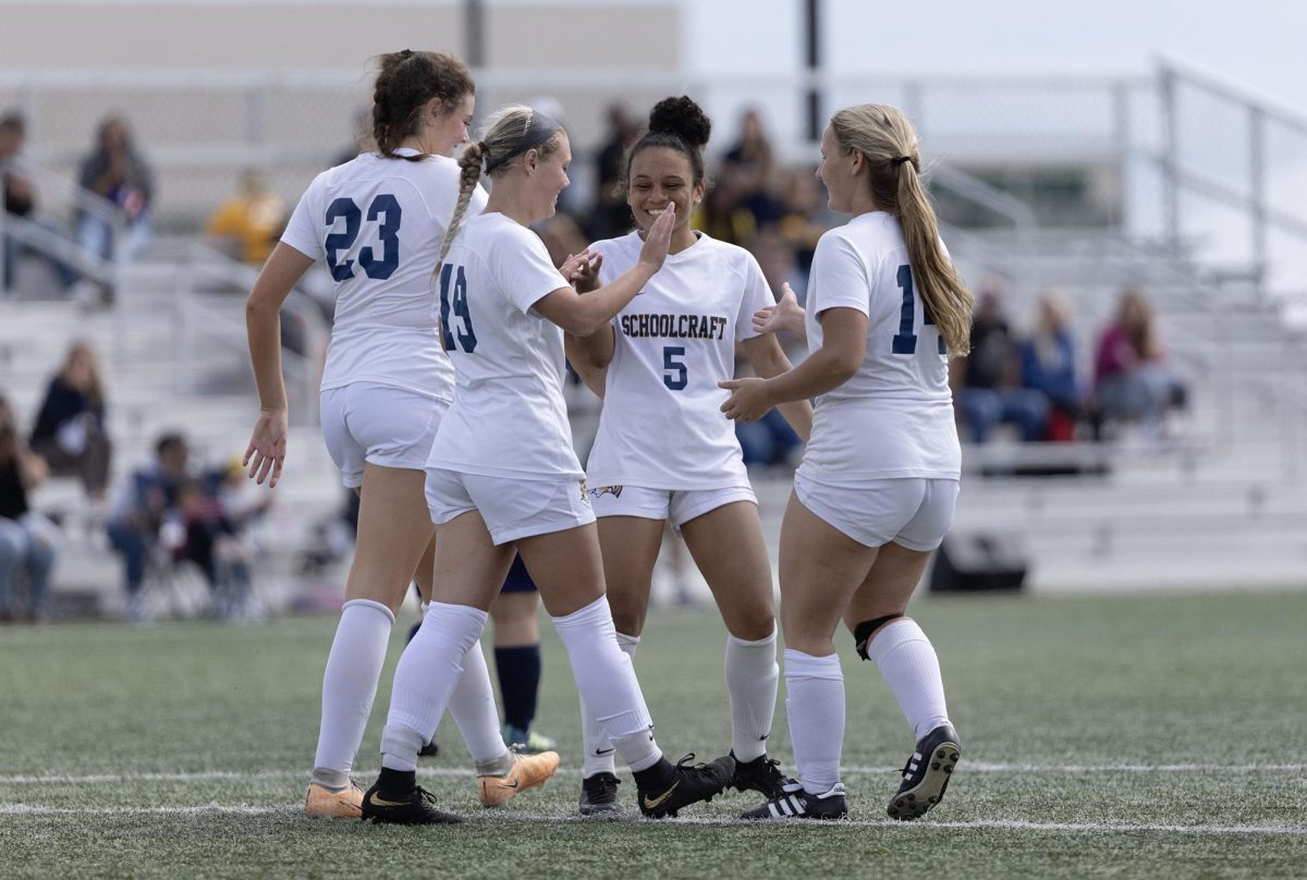 Defenseman Bella Elliot celebrates with teammates after her goal at 74:00, making it 4-1. The Womens Soccer team beat Terra State CC 5-1 on Saturday, September 9, 2023 at Schoolcraft College.