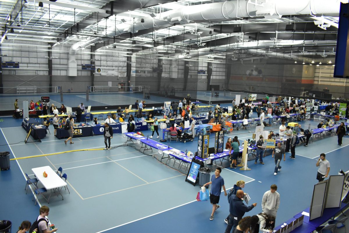 Students, staff, faculty and community members fill the Trinity Elite Sports Center during School Daze Fall Festival on Sept. 18, 2023 at Schoolcraft College