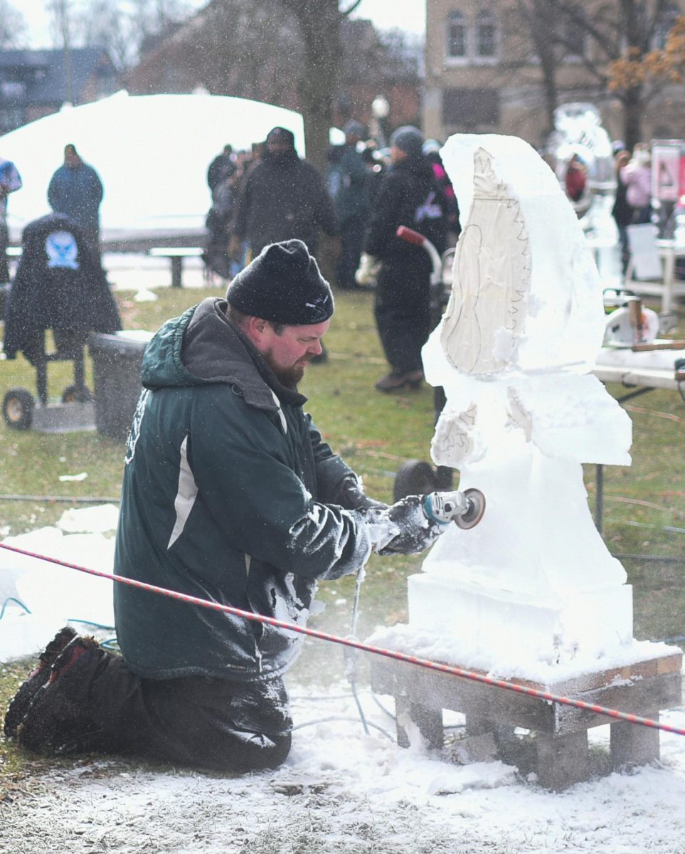 The ice sculptors in Kellogg Park were focused on performing their craft. People who passed by were impressed with such precision and care with the ice Feb. 3, 2024 in downtown Plymouth, Michigan.
