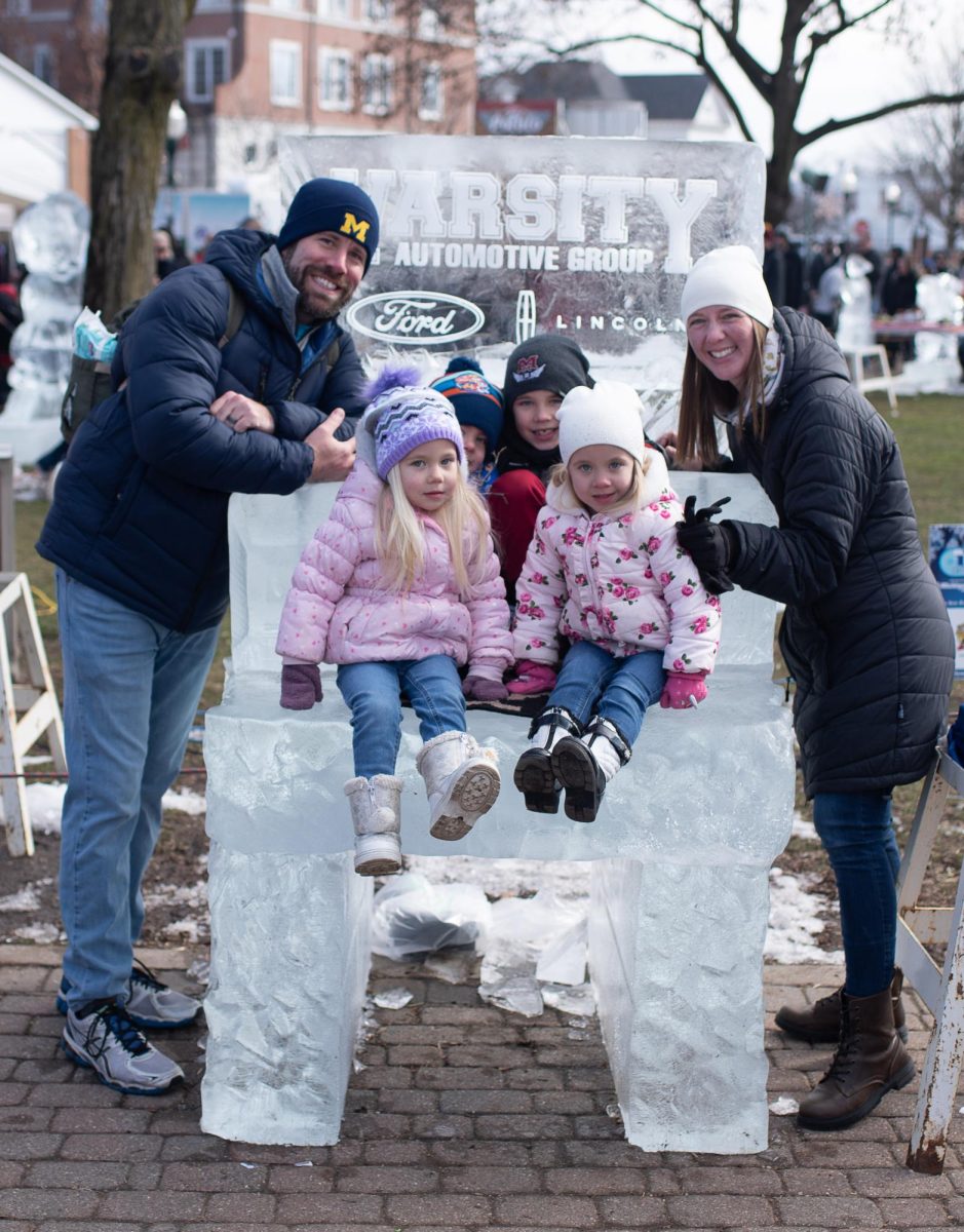 Festival guests will feel like ”Ice Festival Royalty” as they take a seat atop the Ice Throne. This activity has been a tradition for many families, as they return for that picture every year. Sawyer, Lilian, Carly and Denver enjoy took a beautiful family photo at the Plymouth Ice Festival Feb. 3, 2024 in downtown Plymouth, Michigan.
