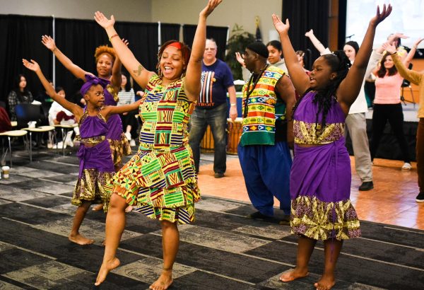 The Marcus Garvey Academy African Drum and Dance ensemble performs at the 19th annual Schoolcraft College Multicultural Fair on March 28, 2024 in the DiPonio Room inside the Vistatech Center.