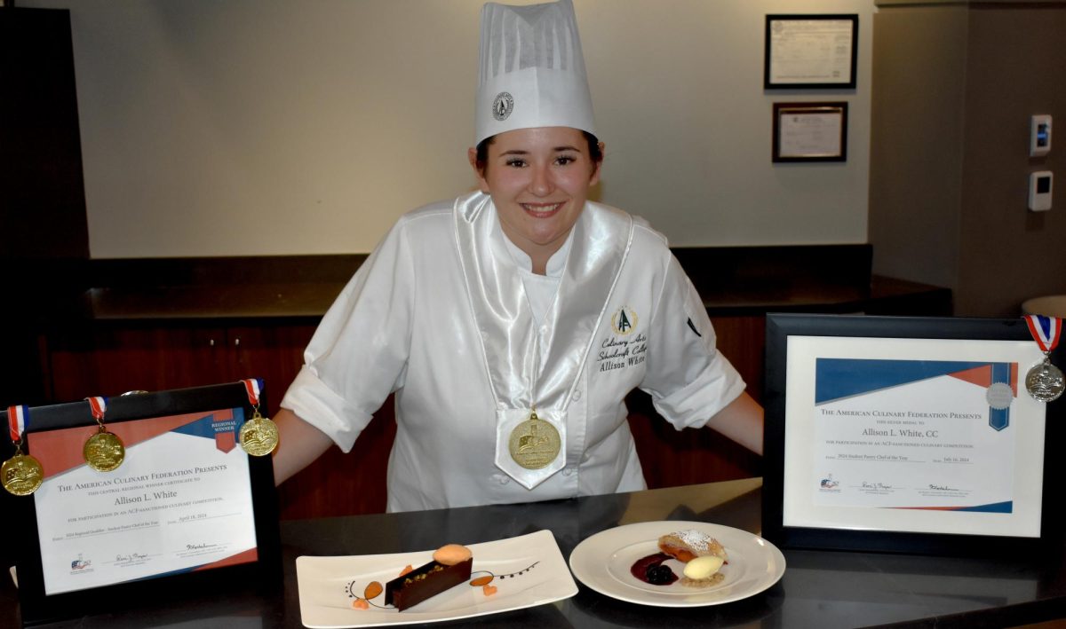 Sous Chef Allison White won the American Culinary Federation National Student Pastry Chef of the Year this past July. White shown here, poses with her awards and winning dishes.