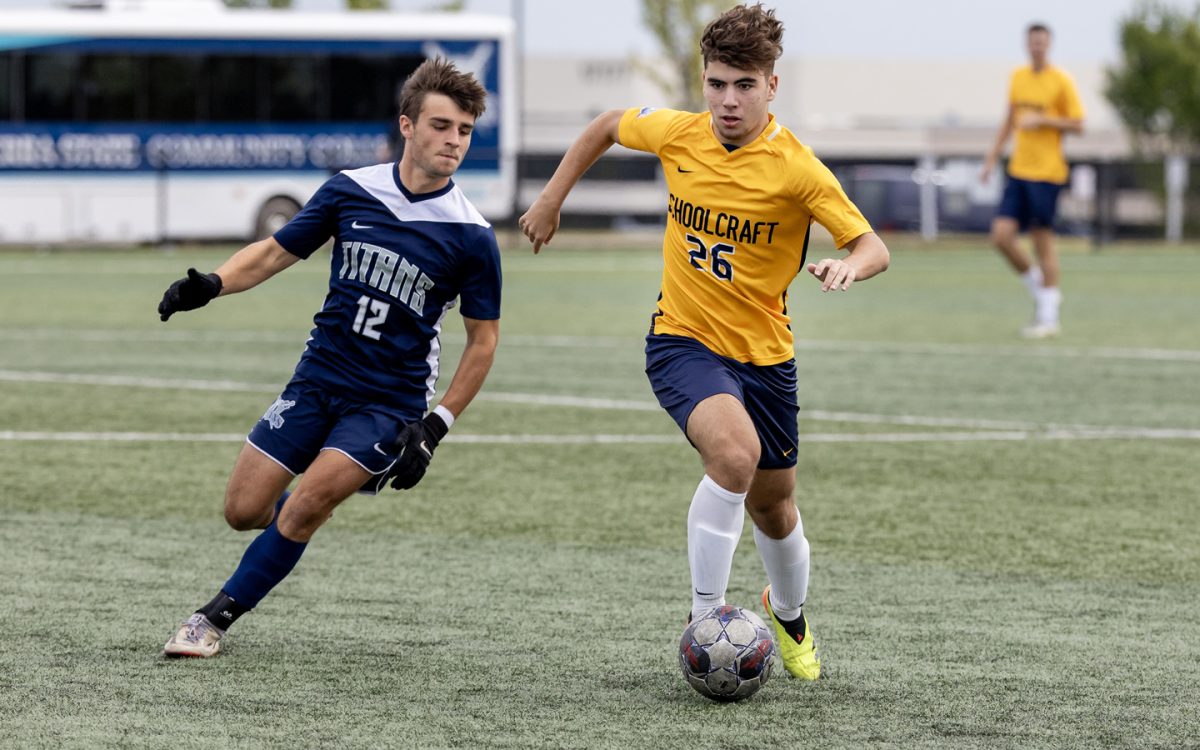 Schoolcraft midfielder Pablo Martin dribbles the ball past a Terra State CC defender on September 27, 2024 at Schoolcraft College in Livonia, Michigan. Martin scored four goals in the game.