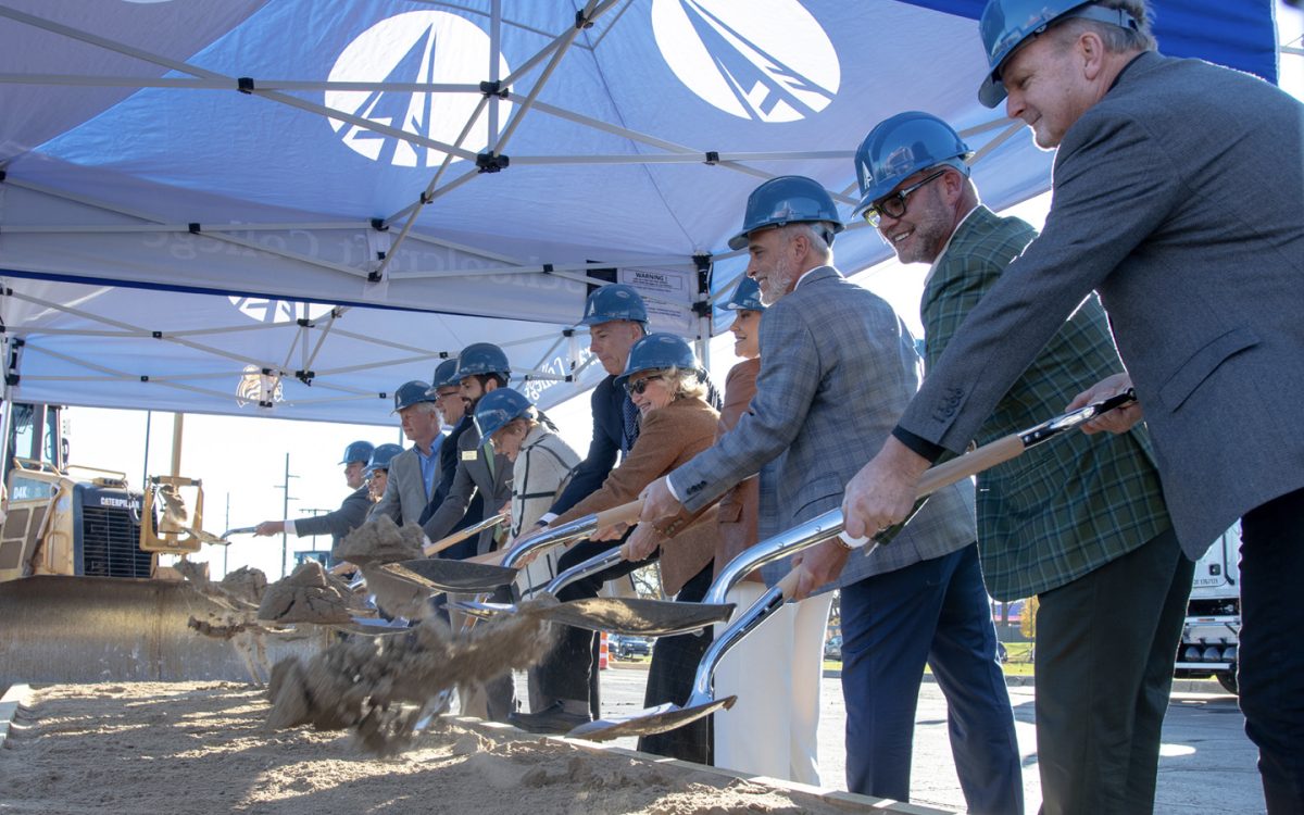 Schoolcraft Board of Trustee members, Schoolcraft College President Dr. Glenn Cerny, Leo Salvaggio, and various delegates from the community gather to break ground for the future Nino Salvaggio International Marketplace on the grounds of Schoolcraft College.