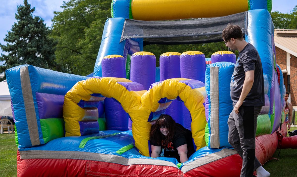 Student took advantage of the bounce house at Ozzypalooza on Wednesday, August 27, 2025.
