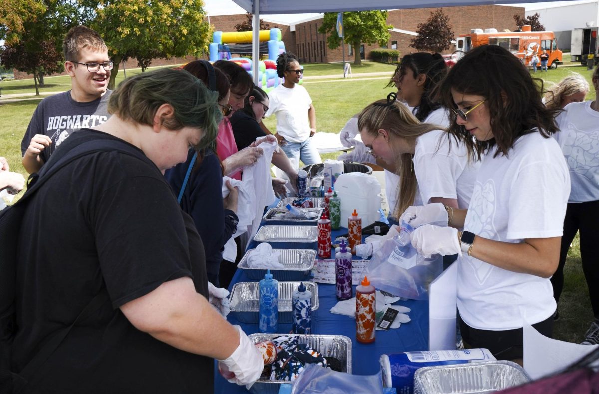The Student Ambassadors hosted a tie dye t-shirt tent at Ozzypalooza on Wednesday, August 27, 2025 from 2 -6 p.m. in the courtyard between the Liberal Arts and Forum buildings. They were giving out white Ozzy Palooza shirts and made individual stations for tie dying.