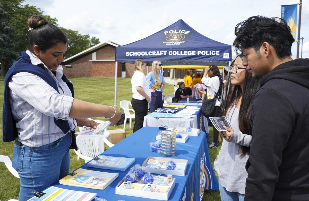 College staff give our information about their department services at Ozzypalooza on Wednesday, August 27, 2025.