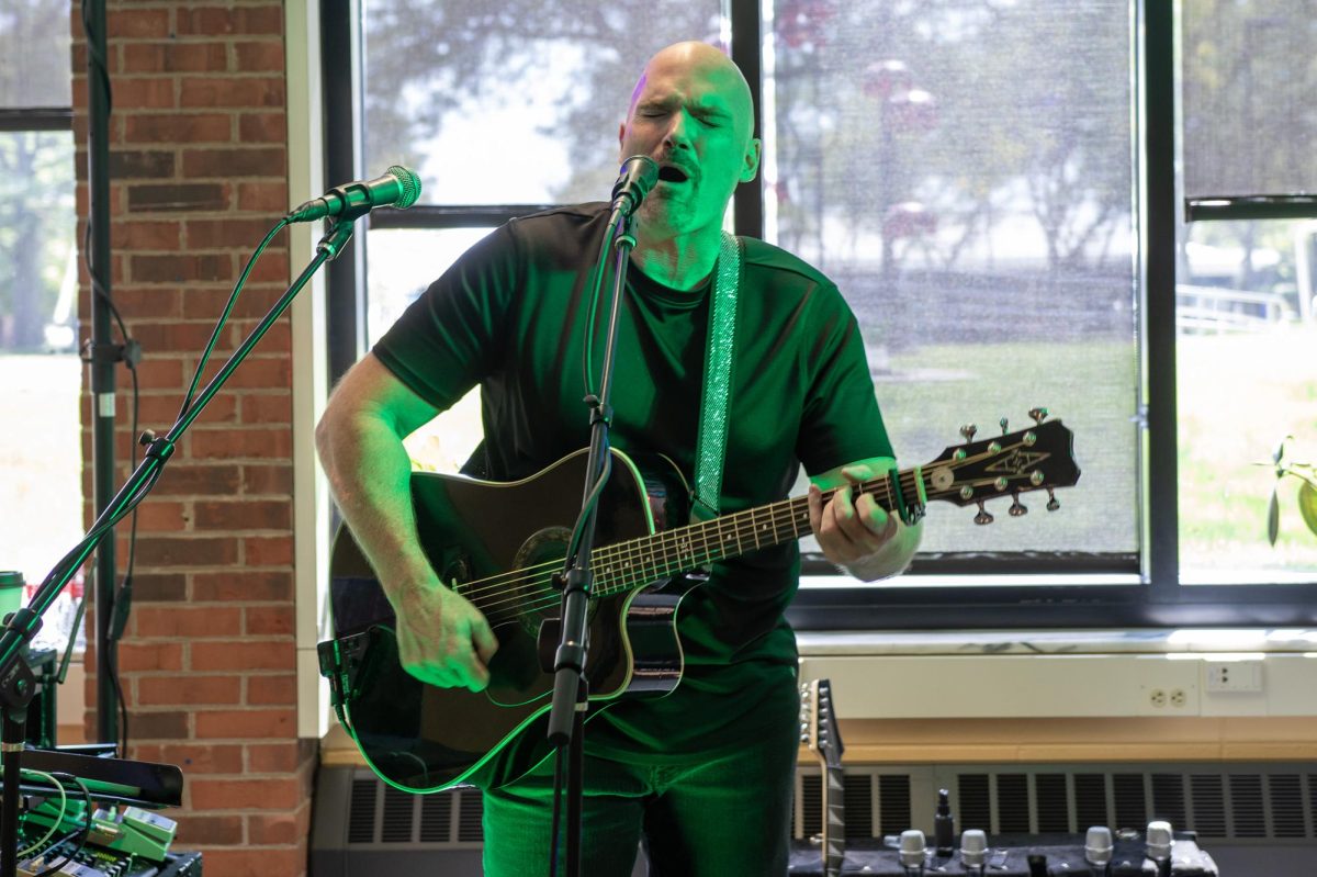 John Rush known as the Human Spotify performs live while a student sings on Sept. 11, 2025 in the Lower Level, Vistatech Center.