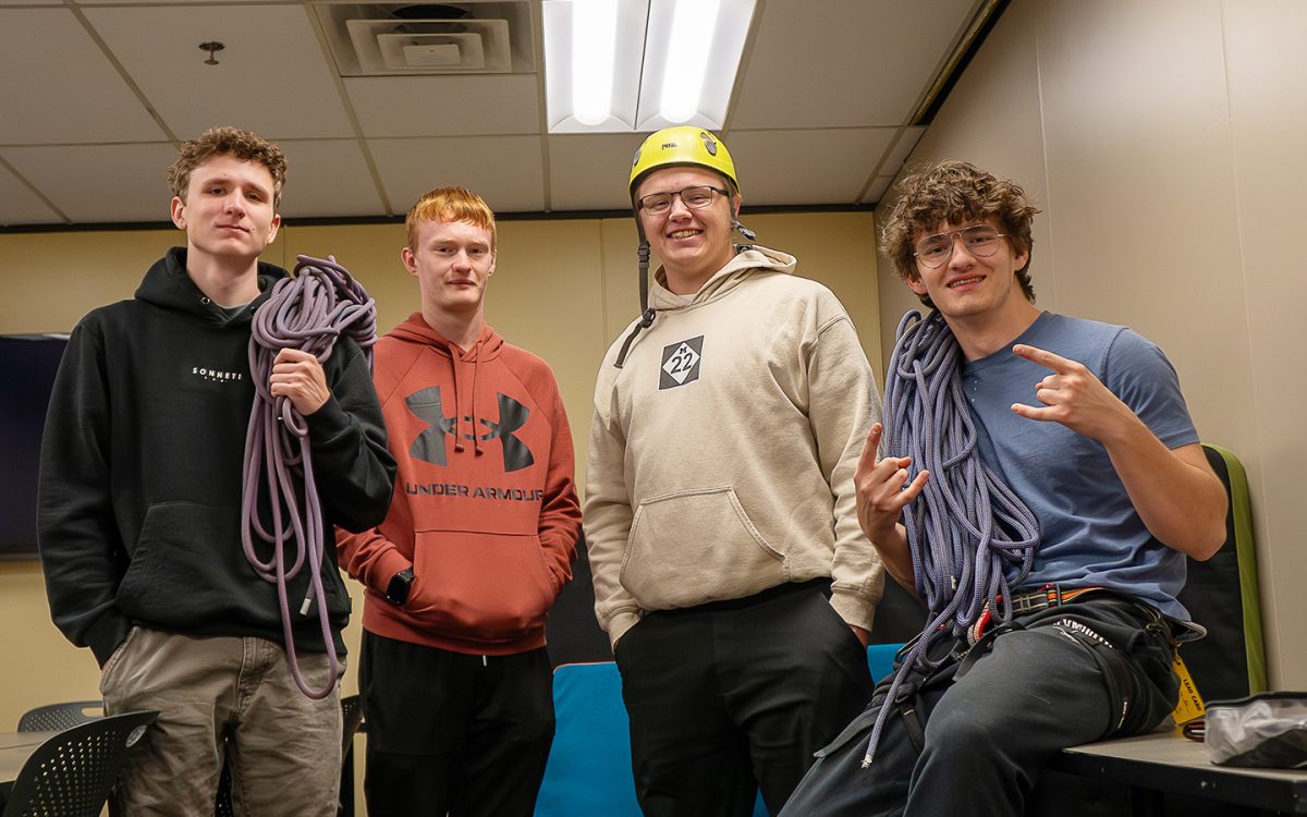 Members of the Rock Climbing Club pose for a photo at one of their meetings.