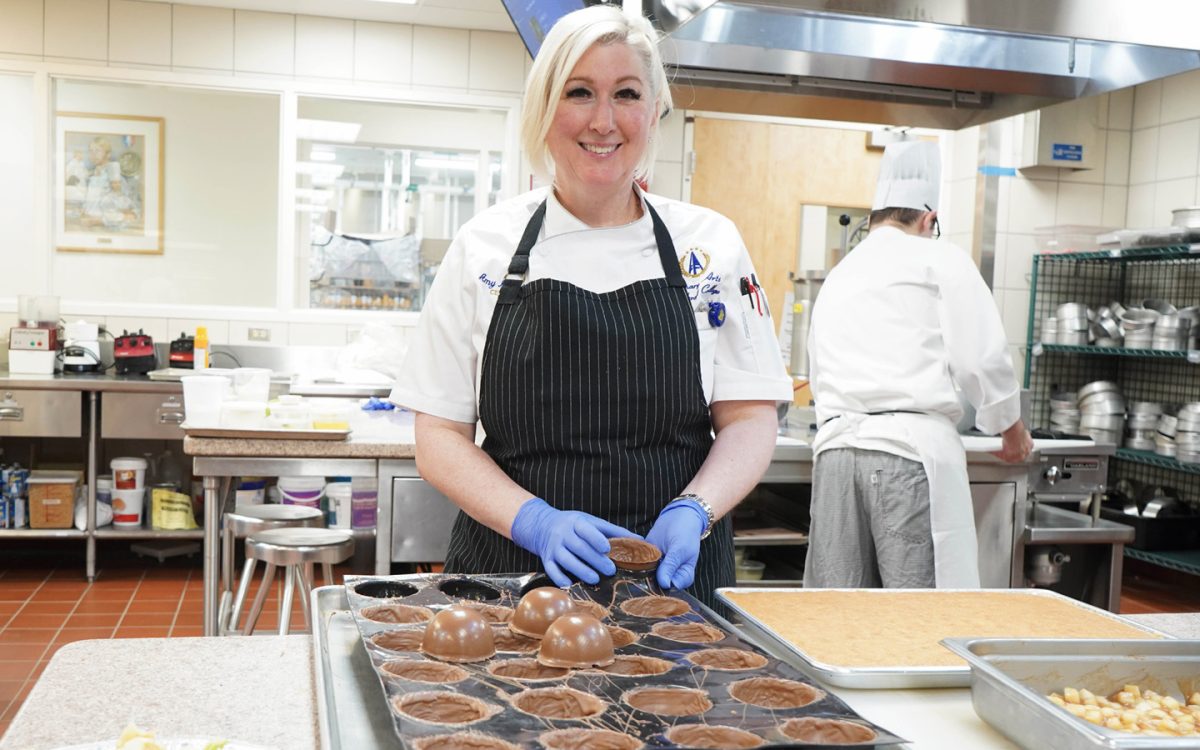 Culinary Arts instructor Chef Amy Knowles poses for a photo in the pastry kitchen. Knowles was awarded the 2025 MI Pastry Chef of the Year.