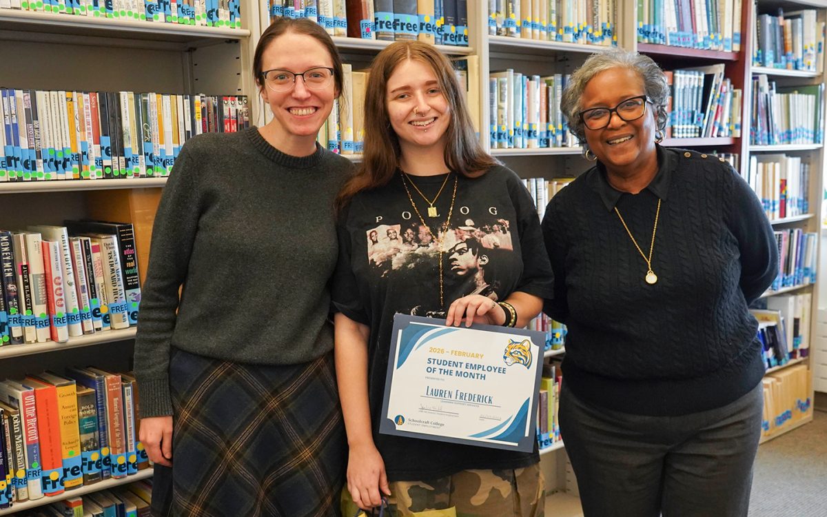 Student Employee of the month for February, Lauren Frederick, a Peer Assisted Learning Leader at the Learning Center, poses for a photo with her supervisors.