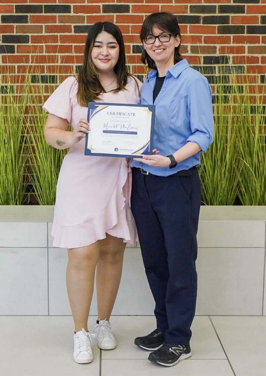 Pili Estevez poses for a photo with Schoolcraft Connection Adviser Rena Laverty.